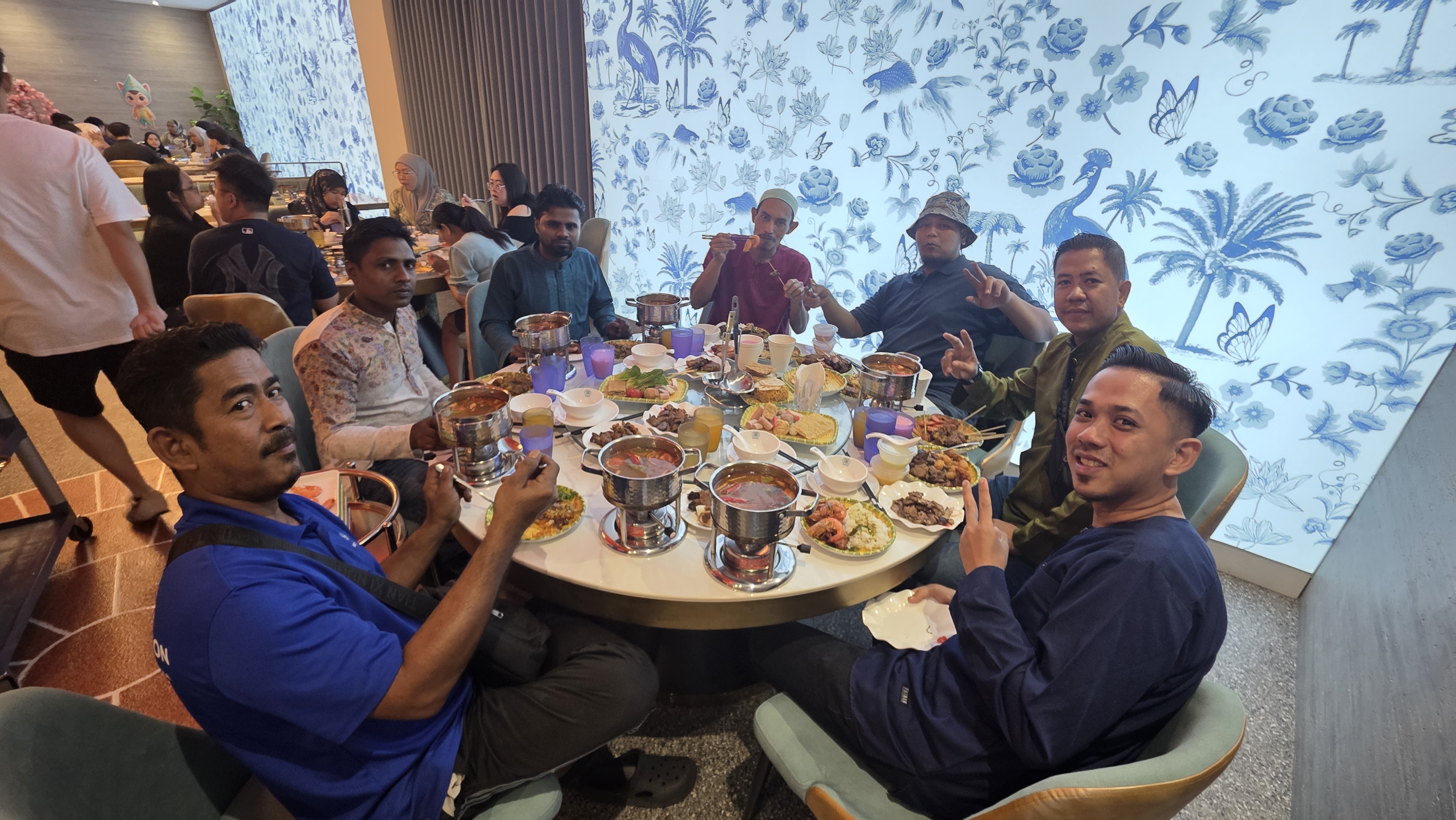 Han Aik Hardware colleagues sharing an iftar dinner