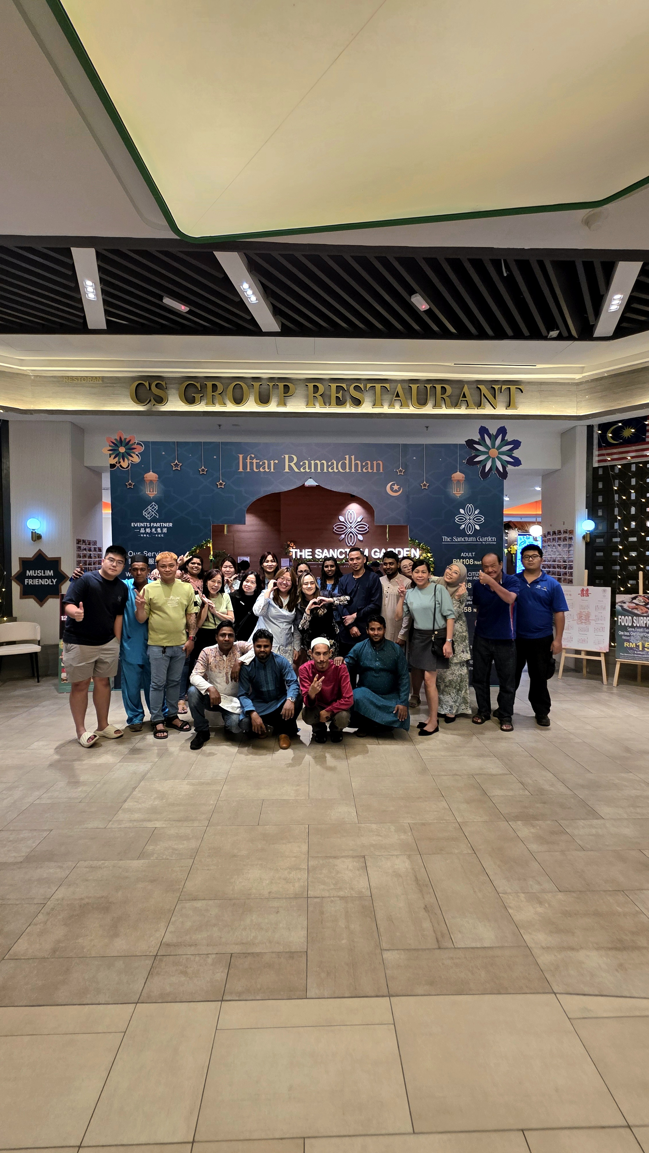 Han Aik Hardware team group photo at an iftar gathering