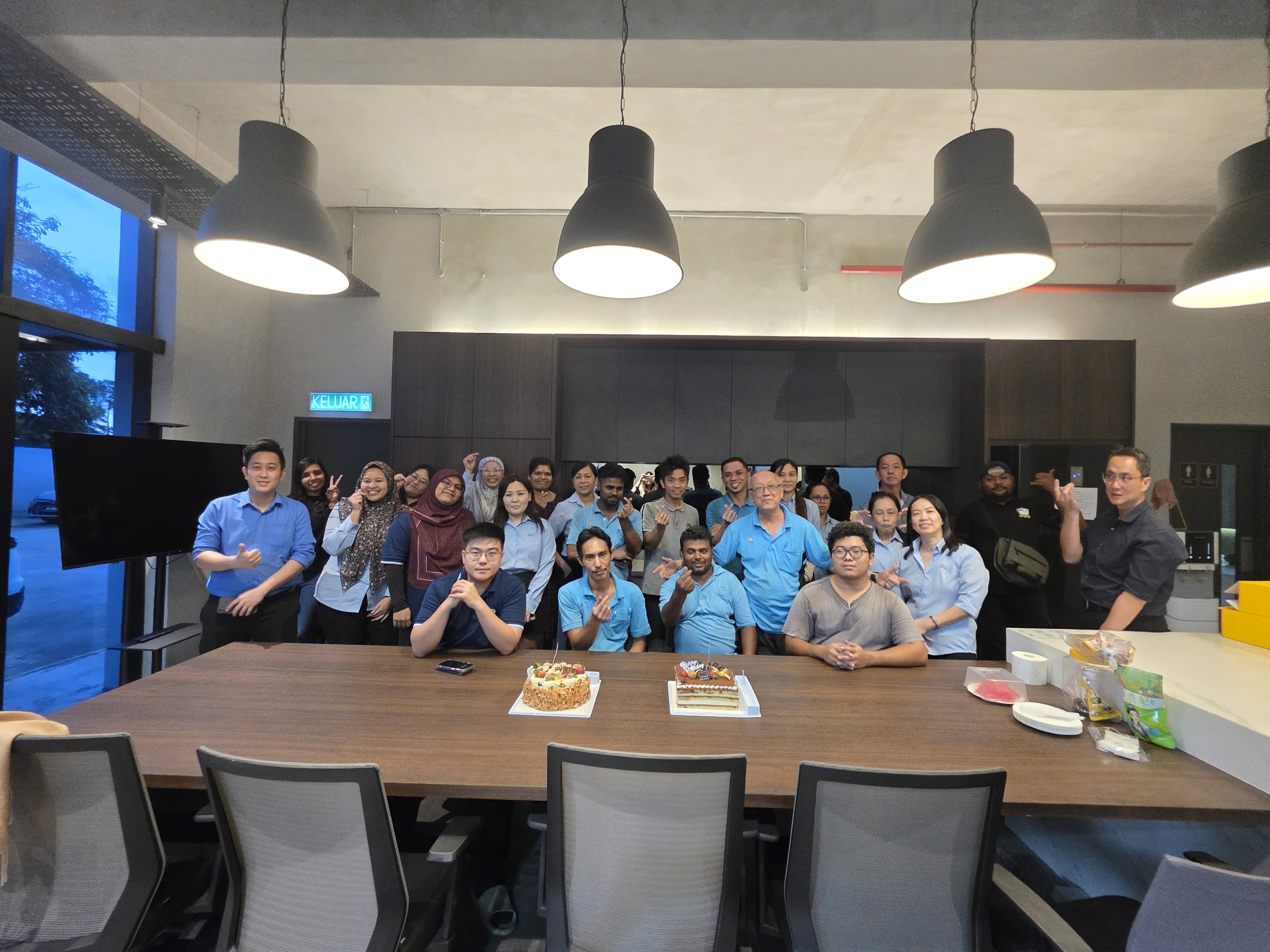 Han Aik Hardware staff at an office celebration